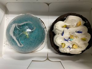 The blue orb was called oasis and it had a delicious key lime filling!   The one on the right was called flowery land and it had these little crunchy bits that were super yum.    at Yun Teehaus in Seoul