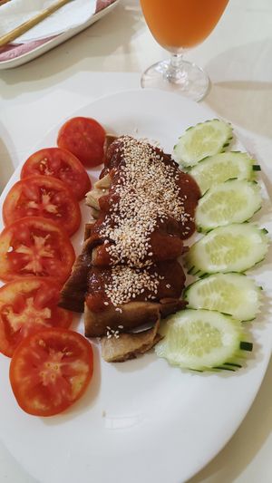 Fried Duck with Peanut sauce at Reunion Cafe in Vientiane