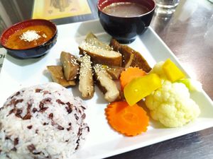 duck with rise and some kind of peanut sauce at Reunion Cafe in Vientiane