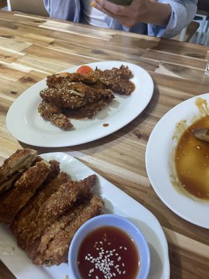 Satay ‘chicken’ and deep friend ‘chicken’, unfortunately had already polished off the teriyaki ‘duck’!  at Reunion Cafe in Vientiane