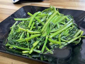 Stir-fried morning glory, 35,000 kip  at Reunion Cafe in Vientiane
