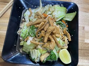 Stir-fried noodles with crispy chicken, 50,000 kip  at Reunion Cafe in Vientiane