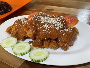 Fried chicken with peanut sauce, 85,000 kip  at Reunion Cafe in Vientiane