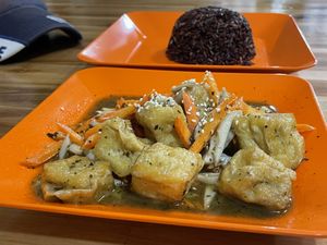 Stir-fried tofu Xian chun leaves, 45,000 kip  at Reunion Cafe in Vientiane