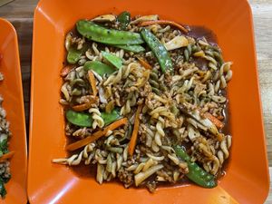 Stir-fried tomato sauce macaroni, 50,000 kip  at Reunion Cafe in Vientiane