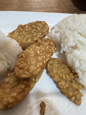 Tempeh. It was lovely. I added rice   at Reunion Cafe in Vientiane