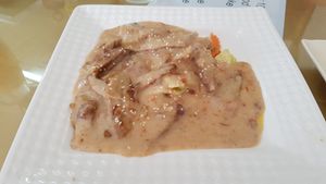 Fried 'duck' with peanut sauce at Reunion Cafe in Vientiane