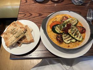 Tomato and harissa tagine with flatbreads   at Cote - Clifton Village in Bristol