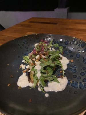 “Eggplant emoji” dish. Smoked eggplant with a cashew cream dressing   at Foxtrot Bistro in Koh Samui