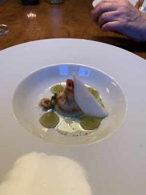 Hazelnut dessert, pear, green tea and a cheeze of some sort, I forget the flavour.  at Kopps in Berlin