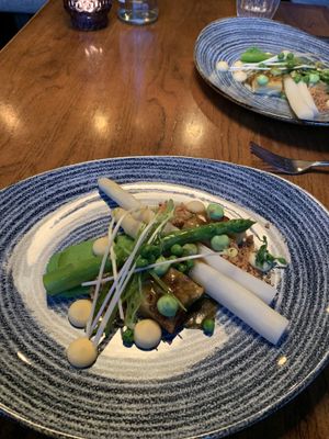 Main - asparagus with peas, wild garlic, potatoes and aioli of some sort.  at Kopps in Berlin