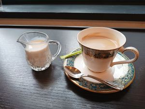 Black coffee with soy milk on the side at Vegan Fruits Cafe Tamaru in Hiroshima