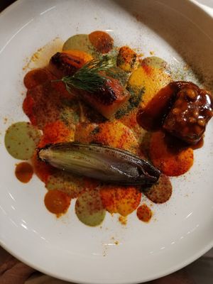 Homemade tempeh, onion and watermelon tataki on veggies creams at Mutty in Castiglione Delle Stiviere