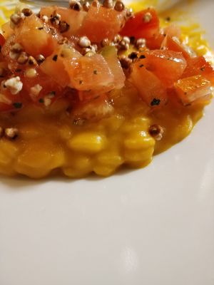 Risotto with carrot cream, smoked tomatos and buckweat popcorn at Mutty in Castiglione Delle Stiviere