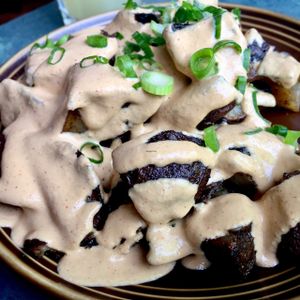 potatoes w/ chipotle cheese and green onions delicious carbs w/ a kick at cafegSC in Santa Cruz