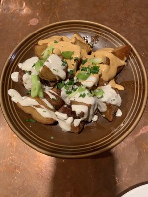 Potato appetizer with half spicy chipotle aoli(not spicy at all, yummy) and half cashew cream(bland) at cafegSC in Santa Cruz