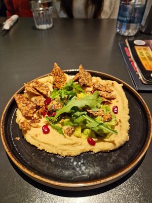 Hummus with full-grain crackers at Happy Bar & Grill in Sofia