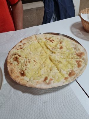 Garlic pizza bread which isn't on the menu but they were happy to make it for us as they have vegan cheese at Mani's in Faro