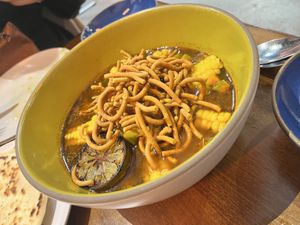 Dal Dhokli - lime, coconut broth, Hodo yuba sheets, and kabocha squash. Unlike any dal I’ve ever had, but was flavorful, refreshing, and satisfying  at Besharam in San Francisco
