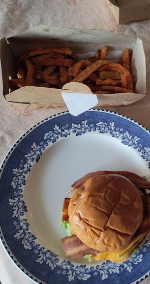 Sweet potato fries and the OAB with bacon at A Burgers in Brussels
