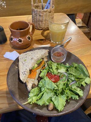 eran dos mitades pero me comi una antes de la foto xq tenia hambree  at Mi Barrio Cafe in Puebla
