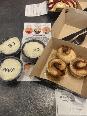 Baby Buns with Cream Cheese, Vanilla, and Cake Batter frostings  at Cinnaholic in Des Moines