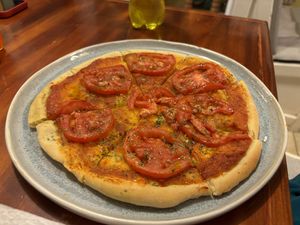 Margarita pizza without cheese   at Sunshine Cafe in Ollantaytambo