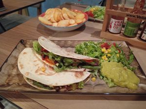 Vegan Wraps (one tofu, one seitan) with fries on the side, plus a wide variety of hot sauces at Bistro Toc in Split