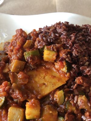 Seitan steak with vegetables and rice.  I ate half of it before I remembered to take a photo.  So yummy!!  at Bistro Toc in Split