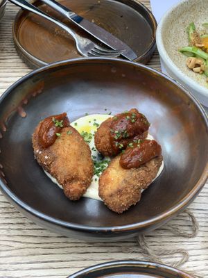 Panko aubergine, harissa, tahini  at Roundhill Restaurant in Brighton