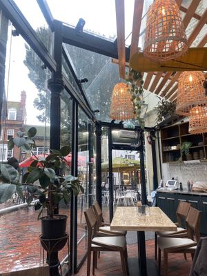 Cozy decor at the conservatory   at Roundhill Restaurant in Brighton
