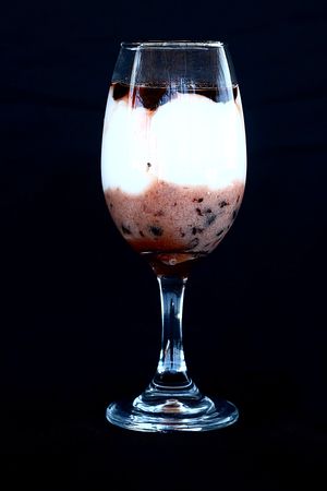 Panna Cotta with Coconut Cream and Spices with berry syrup. at Praana Pousada e Restaurante in Nisia Floresta