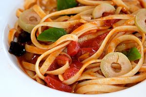 Tagliatelle with homemade tomato sauce, sautéed eggplants, olives and basil. at Praana Pousada e Restaurante in Nisia Floresta
