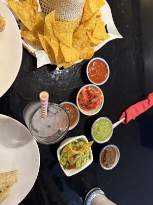Sauces with different levels of spice  at Sunrise Tacos - Silom in Bangkok