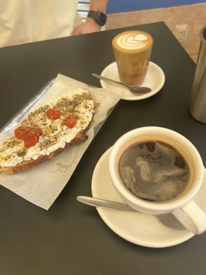 Almond ricotta with roast tomato, cortado with oat milk & americano  at Pantastic in Ibiza