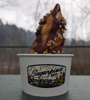 vegan vanilla ice cream with chocolate magic shell, peanut butter magic shell, and peanuts at Sugarpine Drive-In in Troutdale