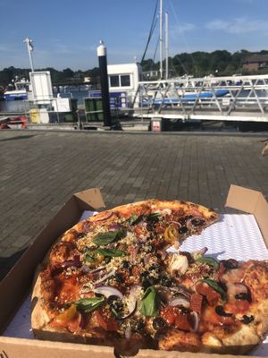 I’d recommend getting it to takeout and eat by the harbour  at eatPIZZA in Lymington