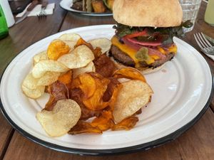 Spicy Burger with patato and sweet patato chips  at To Be in Playa Del Carmen