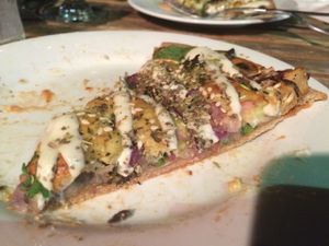 Don't miss 'Cheeky Tuesday' for all you can eat vegan pizza.  Variety of flavors, including dessert ones! at Mandala & Co in Mermaid Beach