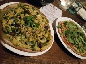 pesto pizza and rocket garlic pizza at Mandala & Co in Mermaid Beach