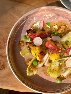 Grilled Peaches, goats cheese mousse, fresh peas, walnut pesto at Dubh in Newbridge