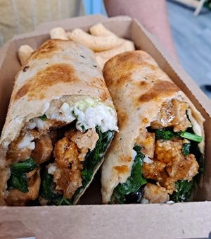 Plant-based Buffalo "Chik'n" Wrap. Made with locally made vegan "chik'n". at Gone Juicing Cafe in New Port Richey