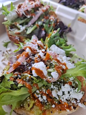 Loaded Avocado Toast on a locally made artisan sourdough bun at Gone Juicing Cafe in New Port Richey