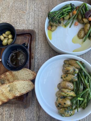 Top - roasted vegetables in a pesto like dressing | bottom baby potato, green beans and caramelised onion dish   at Ronda in Rhodes