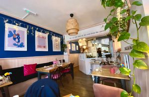 Fun prints, plants, cool vibes.  at Tam's Kitchen in Paignton