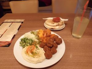 Falafel main dish with Hummus and salad, also home-made lemonade at Hummus Bar - Oktober in Budapest