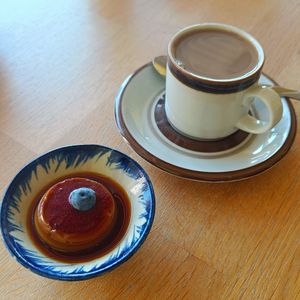 Dessert flan and coffee with oat milk at Whatever in Tampere