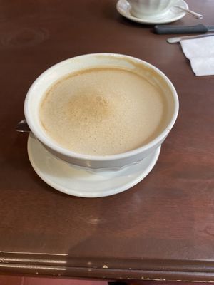 Bowl of cafe au lait with oat milk  at Le Casse-Crêpe Breton in Quebec