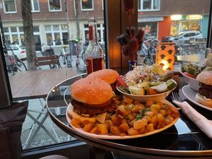 Vegan Boheme and Californication Burgers with potatoes and salad  at Hotel Galactica in Muenster