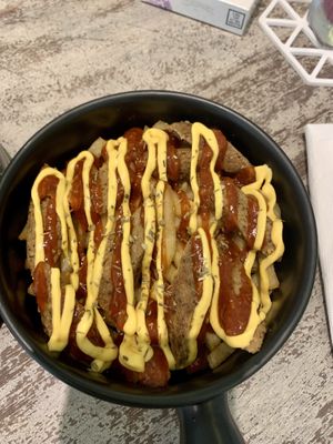 Fries with sausage, bbq and cheese sauce..  at Sauce Tree Kuta in Kuta